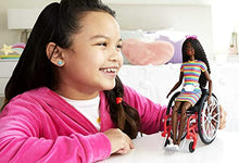 Load image into Gallery viewer, Barbie Fashionistas Doll #166 with Wheelchair &amp; Crimped Brunette Hair Wearing Rainbow-Striped Dress, White Sneakers, Sunglasses &amp; Fanny Pack, Toy for Kids 3 to 8 Years Old [Amazon Exclusive]
