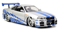 Jada Toys Fast & Furious Brianâ??S 2002 Nissan Skyline R34 Die Cast Car, 1:24 Scale, Silver & Blue