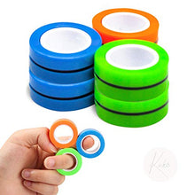 Load image into Gallery viewer, Kicko Magnetic Fidget Rings - 6 Pack - Neon Blue, Green, Orange - Magic Spinning Sensory Toys for Kids, Boy or Girl, Birthday Parties, Classrooms, Learning Motor Skills, Colorful Focus Game
