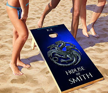 Load image into Gallery viewer, DaVinci Wrap Masters Personalized &#39;House of Targaryen Laminated Vinyl Corn Hole Board Decals.
