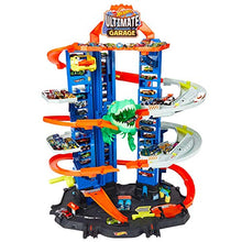 Load image into Gallery viewer, Hot Wheels City Ultimate Garage Track Set with 2 Toy Cars, Garage Playset Features Multi-Level Racetrack, Moving T-Rex Dino &amp; Storage for 100+ 1:64 Scale Vehicles, Toy Gift for Kids 3 Years &amp; Older
