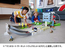 Load image into Gallery viewer, Hot Wheels Mario Kart Track Set Assortment 4 different tracks with Mario Kart 1:64 scale vehicles and nemesis from video game gift for kids 3 years and older
