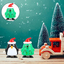 Load image into Gallery viewer, NUOBESTY 2 Pcs Christmas Wind Up Toy Xmas Tree Penguin Holiday Party Favors Jumping Novelty Toys Children Festival Toys Kids Gift Decorative Props
